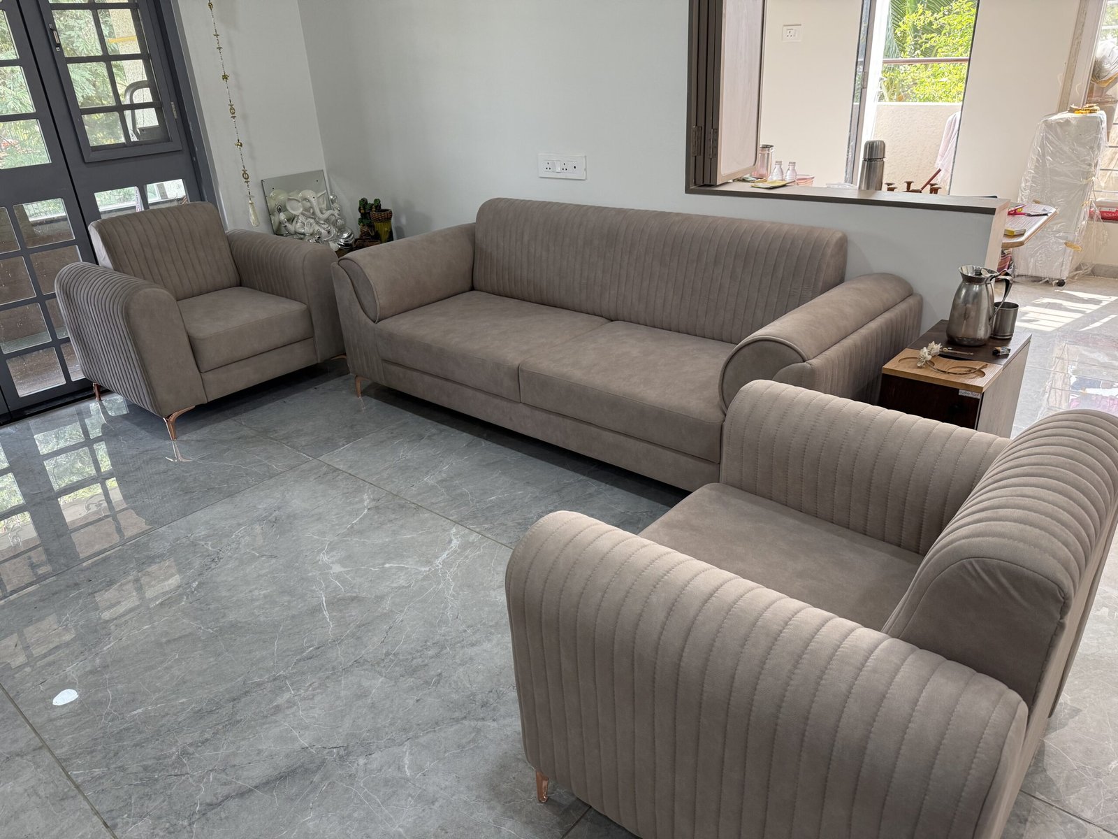 Taupe sofa and armchairs