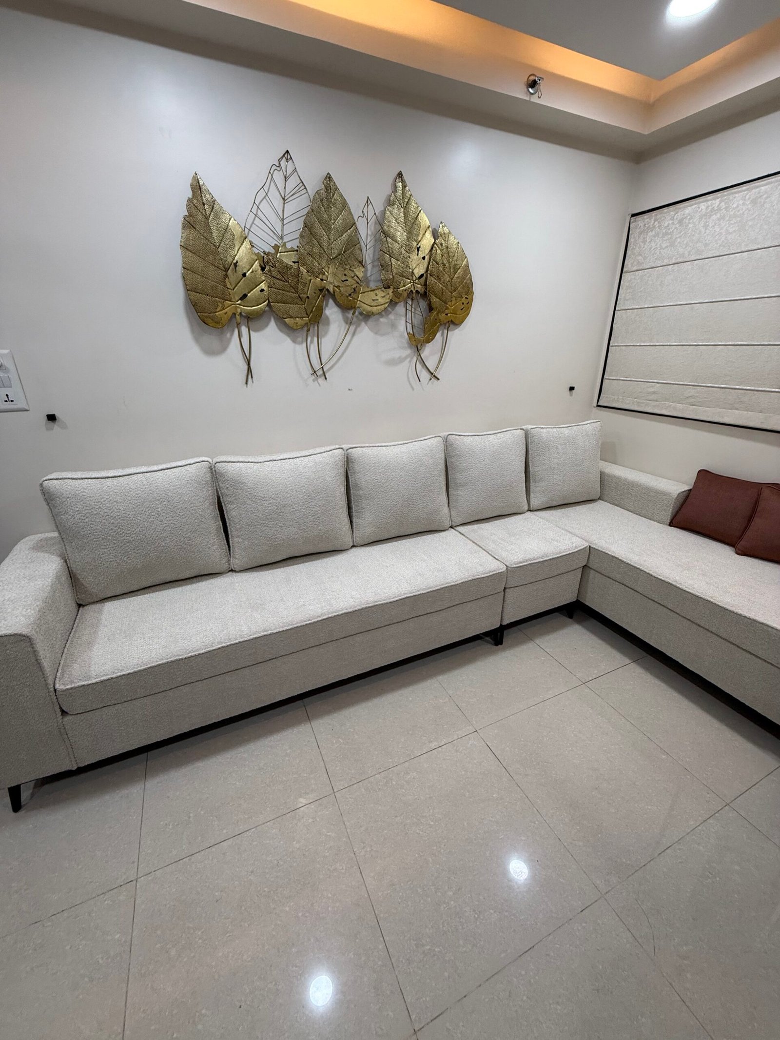 Light L-shape sofa in a finished living room